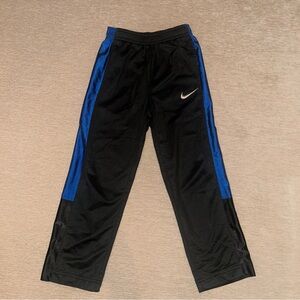 Nike Kids Black Joggers with Blue Stripes Size 5